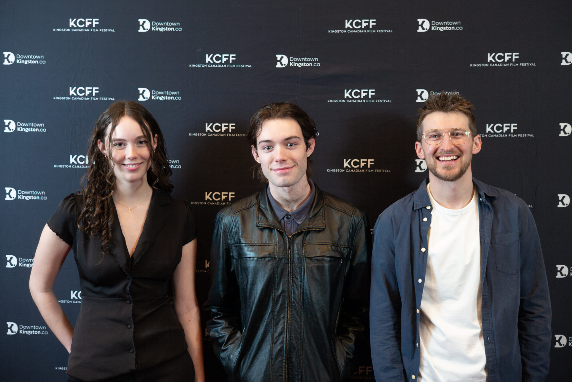Three people smiling on the Slaight Music Video Red Carpet.